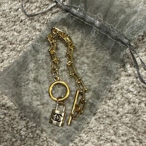 Gold-Tone Padlock Charm Bracelet with Toggle Clasp